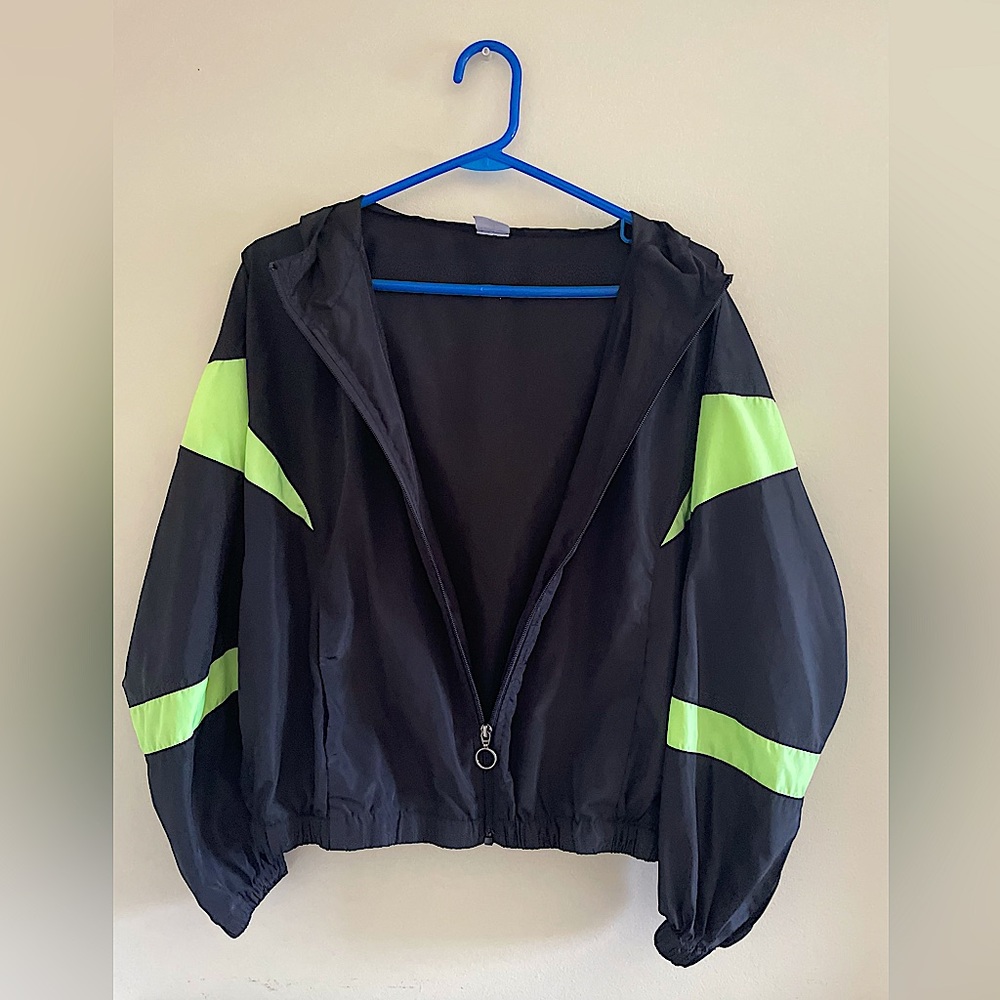 Black windbreaker hoodie with neon detailing